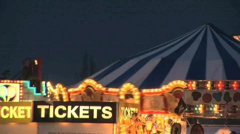 Merry Go Round Carousel and Ticket Booth at Carnival Stock Footage 112637