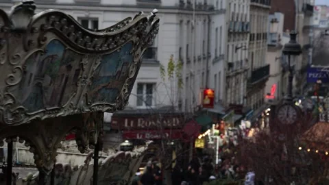 Merry go round carousel in Paris, cinematic b roll lifestyle establisher. Stock Footage 331562774