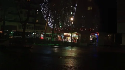 Merry-go-round carousel on a rainy night in Montreuil, France Stock Footage 71281886