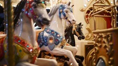 Merry go round carousel spinning at night. Video stock 137674857