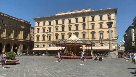 Merry-go-round carousel spins at the Firenze city square. Florence, Italy Stock Footage 159367716