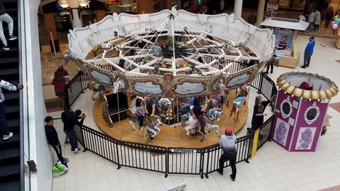 A Merry Go Round in a mall 스톡 동영상 108194335