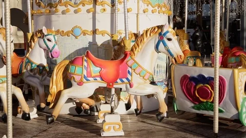 Merry go round at the park (carousel horse) Video stock 98283145