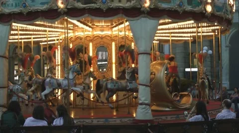 Merrygoround in a city square. Stockbeeldmateriaal 65492520