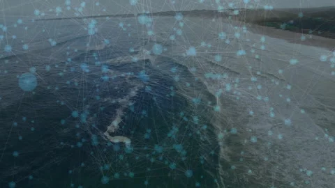 Mesh appearing, network overlay growing over coast, nodes pulsing data along Stock Footage 311664354