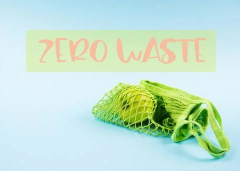 Mesh bag with green apple. Zero waste concept Stock Photos