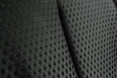 Mesh pattern background.Background patterned leather car seats. Stock Photos