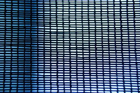 Mesh texture. Mesh on the window. Grid for the background. Stock Photos