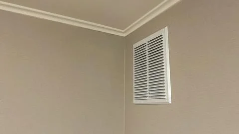 Mesh in wall for kitchen exhaust pipe Stock Photos