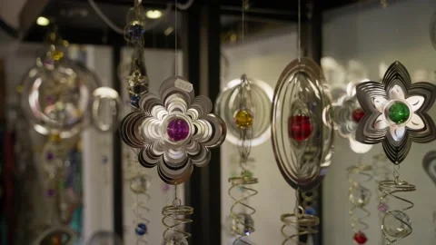 Mesmerising and shiny spinning objects with colourful stones in slowmotion Stock Footage 239540691