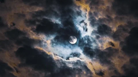 The mesmerising beauty of the night sky. Full moon time lapse. Clouds look like Stock Footage 253506782