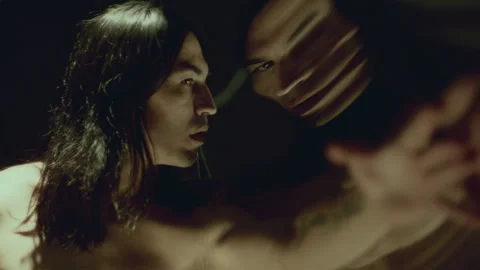 Mesmerized Dancer Leaning against Distorting Mirror in Contemporary Performance Stock Footage 289874030