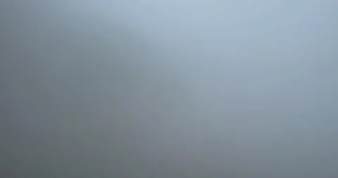 A mesmerizing 4K UHD aerial drone footage showcasing a foggy forest landscape Stock Footage 297572407