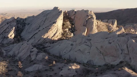 A mesmerizing aerial shot captures the Devil's Punchbowl at sunset, Stock Footage 280129879