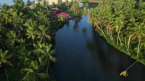 Mesmerizing aerial view on the backwaters connected to a beach, Kannur India Stockbeeldmateriaal 261821362