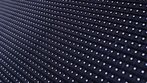 A mesmerizing array of illuminated pixels, textured dots black background Stock Photos