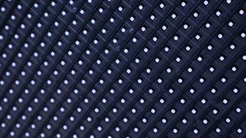 A mesmerizing array of illuminated pixels, textured dots black background Stock Photos