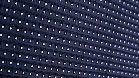 A mesmerizing array of illuminated pixels, textured dots black background Stock Photos