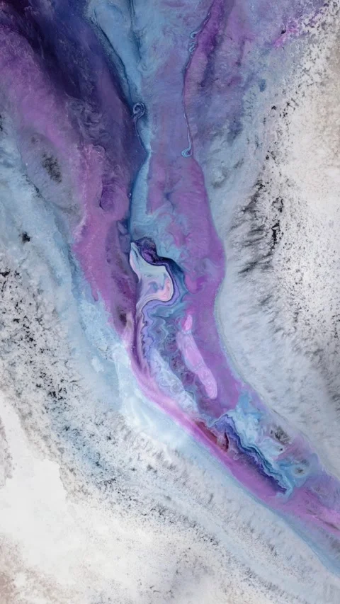 A mesmerizing blend of purple and blue swirling patterns on a canvas from an art Stock Footage 288012426