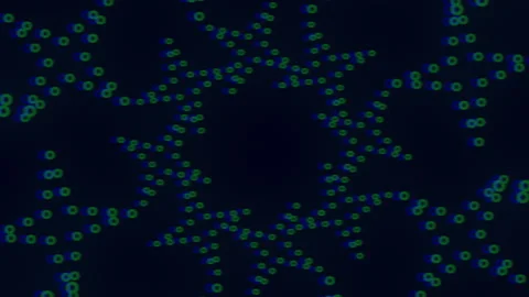 Mesmerizing circular pattern of blue stars and green dots Vídeo Stock 274186634