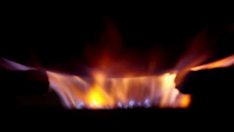 A mesmerizing close-up of dancing flames captured in stunning 4K slow motion. Stock Footage 341669318