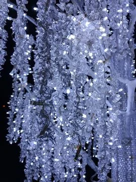 A mesmerizing, close-up vertical shot of crystal-like LED Christmas lights il Stock Photos