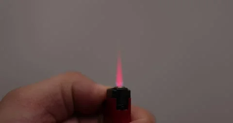 A mesmerizing close-up video of a lighter flame Stock Footage 316595818