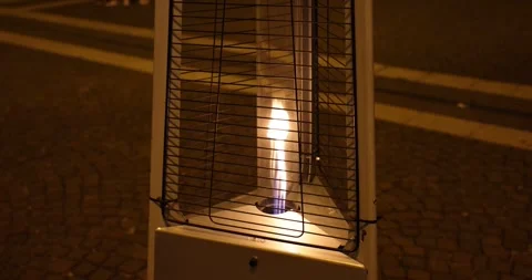 A mesmerizing close-up video of a single flame dancing and flickering with raw Stock Footage 318537077