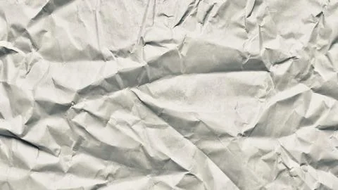 Mesmerizing crumpled white paper texture with intricate folds deep shadows an Stock Photos