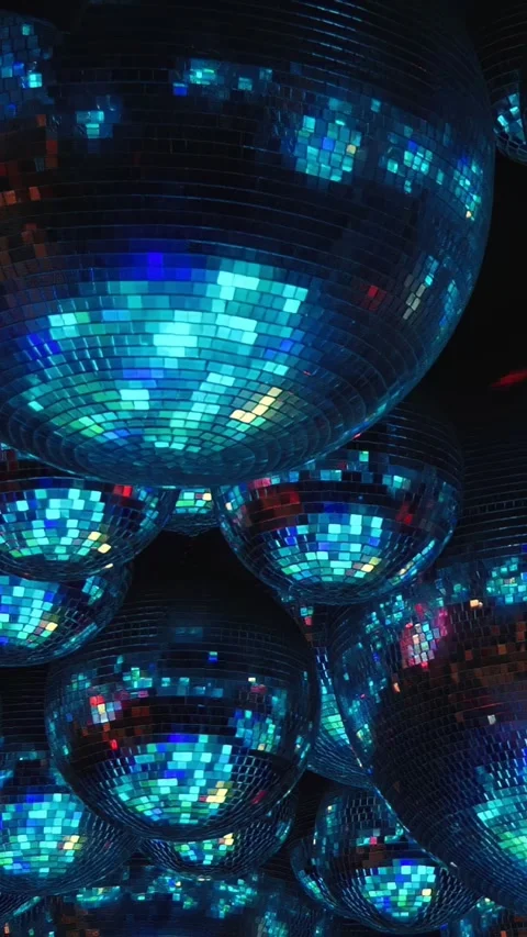 Mesmerizing Disco Ball Light Show with Kaleidoscopic Effects Stock Footage 299460762