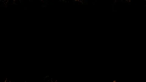 Mesmerizing display of golden particles scattered across black background Stockbeeldmateriaal 291986344