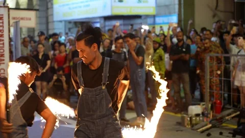 Mesmerizing fire flame performance dazzles the festival crowd. Видео 317006578