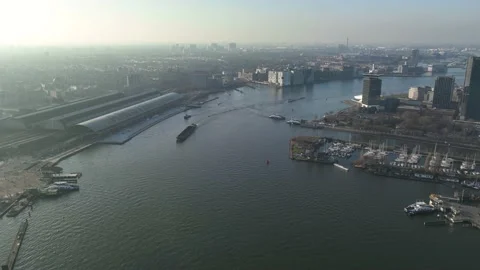 A mesmerizing hyperlapse of Amsterdam's central station offers a glimpse into Stock Footage 233971121