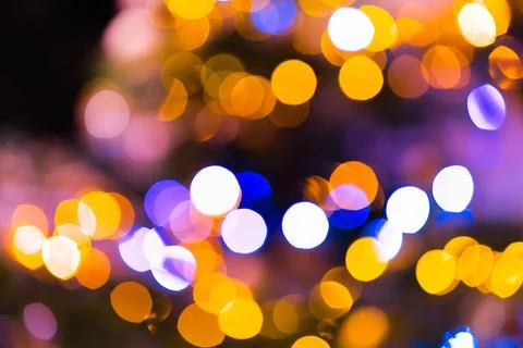 A mesmerizing image captures the enchanting glow of blurred lights. Stock Photos