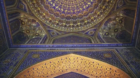 The mesmerizing interior of the Tilla-Kari Mosque in the historical Registan Stock Footage 243762276