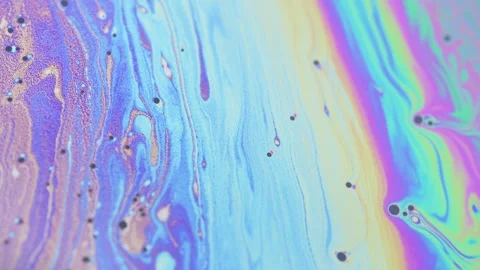 Mesmerizing iridescent soap bubble surface with flowing colors and dark spots Stock Footage 332167377