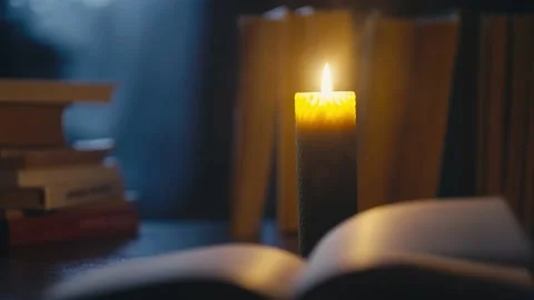 The mesmerizing light of a candle surrounded by a large number of candles. Stock Footage 234178597