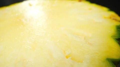Mesmerizing macro video of a Pineapple Slice, captured with a probe lens. Stock Footage 246594615