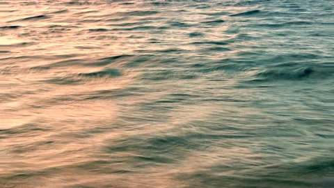  mesmerizing movement of the sea waves at sunset Stock Footage 133731093