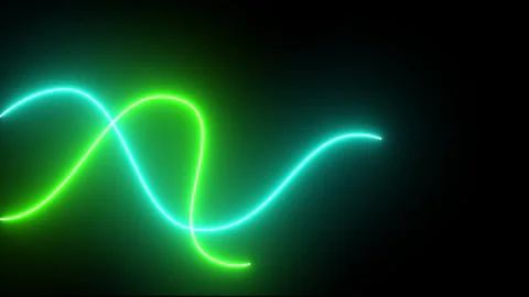 Mesmerizing neon light trails dance in the darkness with green and cyan glow Stock Footage 319826651