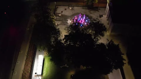 Mesmerizing Night Drone Flight Towards Colorful Fountain Stock Footage 272660416