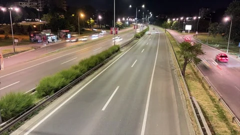 A mesmerizing nighttime timelapse of a bustling highway Stock Footage 311934965