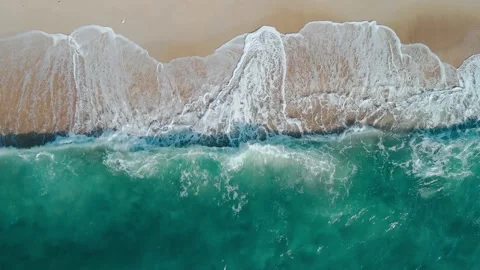 Mesmerizing ocean waves sandy shoreline aerial top view. Expanse ocean majestic Stock Footage 273436698