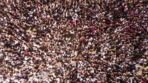 Mesmerizing pattern of people dancing in mosh pit at crowded festival Stock Footage 262615376