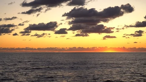 Mesmerizing sea sunset cloudy sky golden sun landscape ecology Stock Footage 116446807