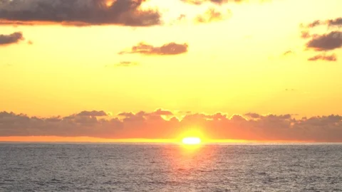 Mesmerizing sea sunset cloudy sky golden sun landscape ecology Stock Footage 116446965