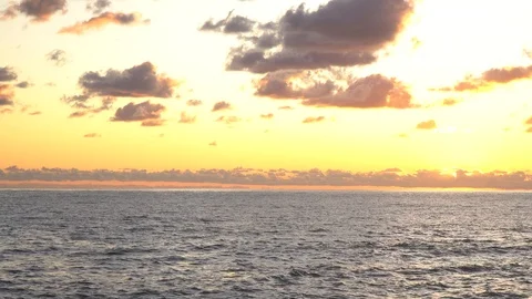 Mesmerizing sea sunset cloudy sky golden sun landscape ecology Stock Footage 116446976