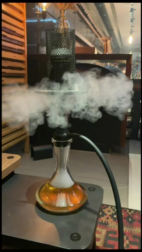 A mesmerizing slow-motion close-up of a hookah in action Stock Footage 312392269