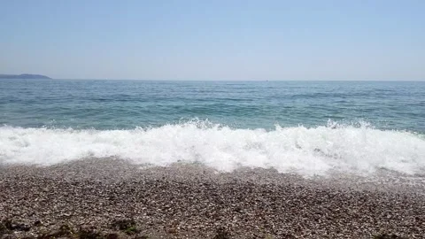 Mesmerizing Slow Motion Ocean Waves Crashing Onto A Shingle Beach Shoreline Stock Footage 337490304
