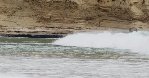 Mesmerizing Slow Motion Waves Crashing on Rocky Beach - High-Quality Stock Stock Footage 240957048